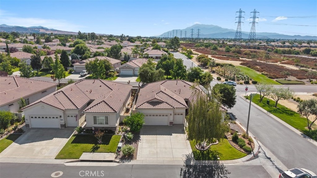1706 Brittney Road Beaumont, CA 92223 - Photo 36 of 44 an aerial view of residential houses with outdoor space and street view