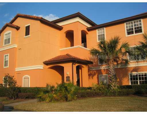 5479 Vineland Road, Unit 9108 Orlando, FL 32811 - Photo 1 of 1 a front view of house with yard