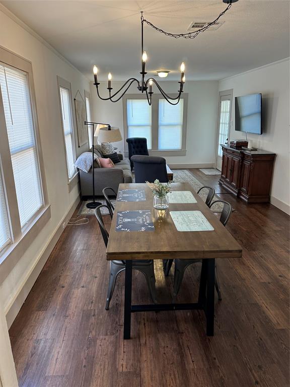 3204 North 24th Street Waco, TX 76708 - Photo 12 of 16 a view of a dining room with furniture and wooden floor