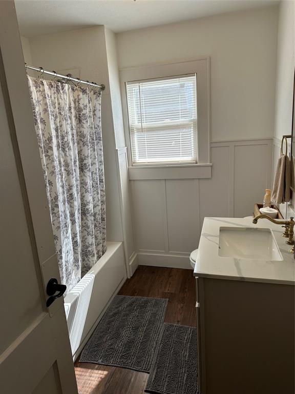 3204 North 24th Street Waco, TX 76708 - Photo 15 of 16 a bathroom with a sink and a mirror