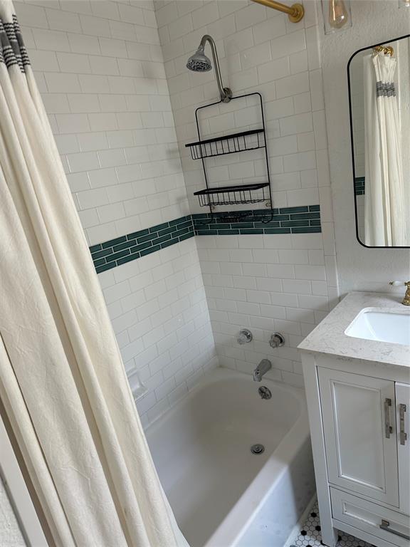 3204 North 24th Street Waco, TX 76708 - Photo 6 of 16 a bathroom with a shower and a sink