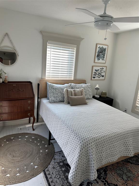 3204 North 24th Street Waco, TX 76708 - Photo 7 of 16 a bedroom with a bed and a night stand