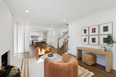 a kitchen with a table and chairs in it