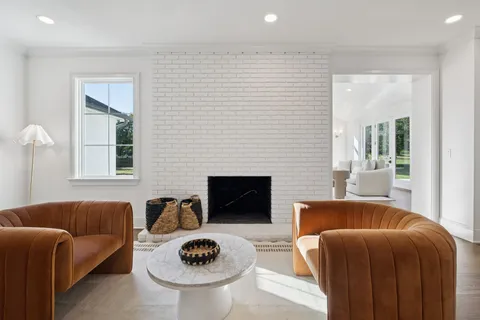 a bathroom with a sink a mirror and a shower