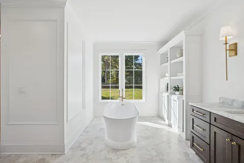 aerial view of a house with a yard