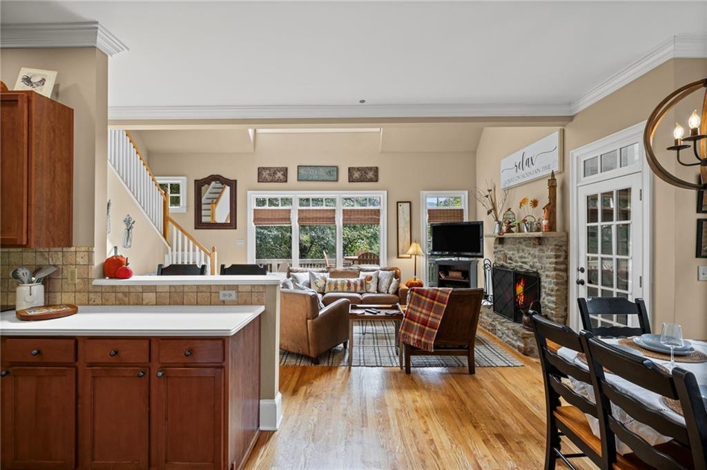 23 Laurel Ridge Trail Big Canoe, GA 30143 - Photo 11 of 36 a view of a kitchen with kitchen island granite countertop a sink and a stove top oven