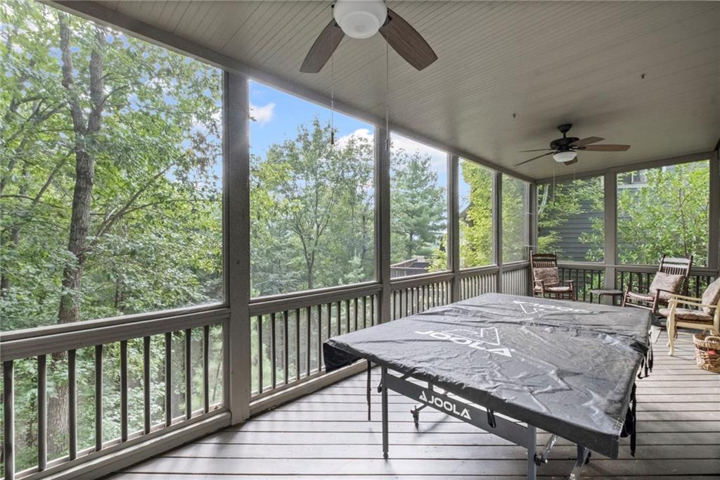 23 Laurel Ridge Trail Big Canoe, GA 30143 - Photo 34 of 36 a view of a dining room with furniture window and outside view