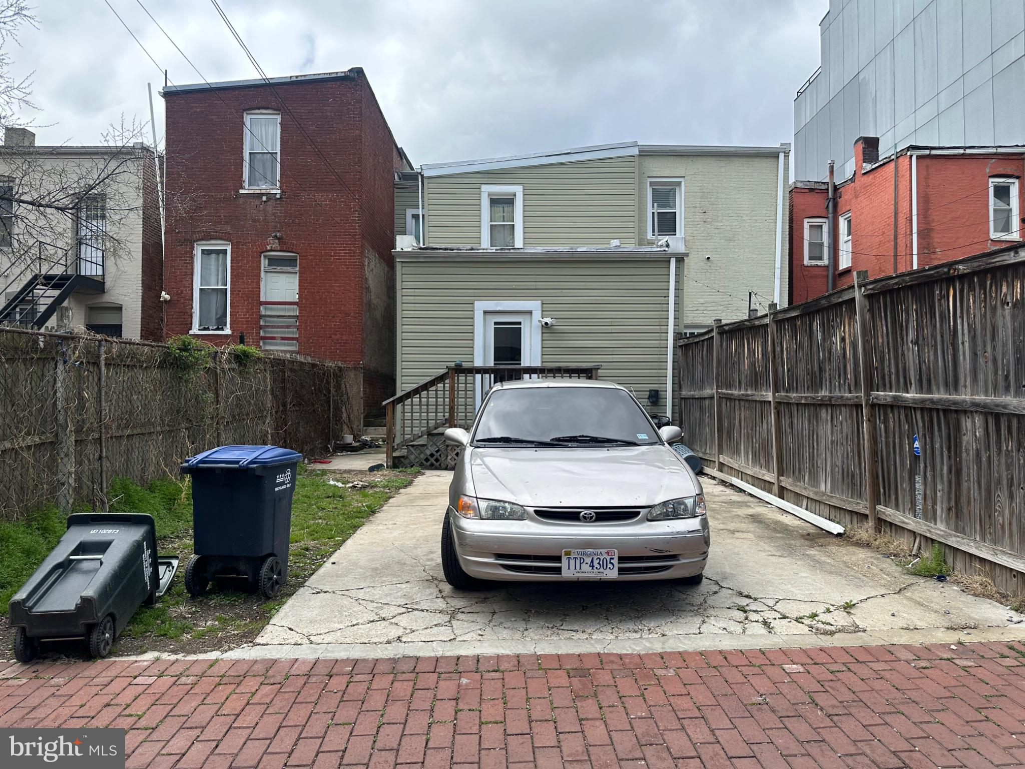 2225 12th Street Northwest Washington, DC 20009 - Photo 7 of 9 a car parked in front of a house