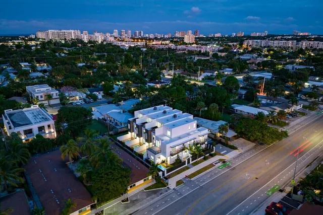 an aerial view of a house with a garden