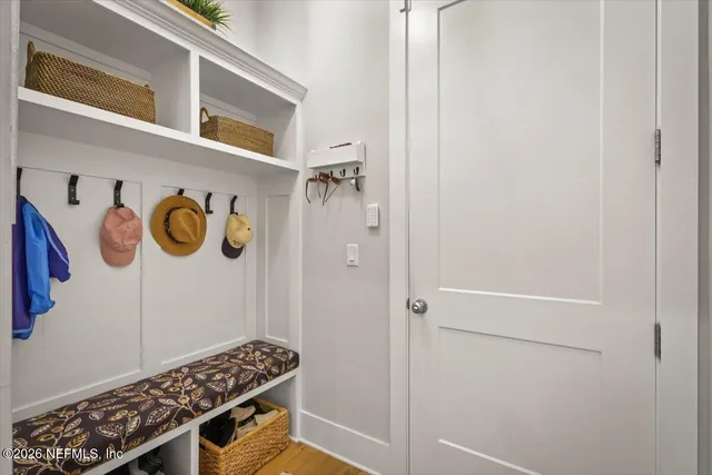a bathroom with a window and a shower