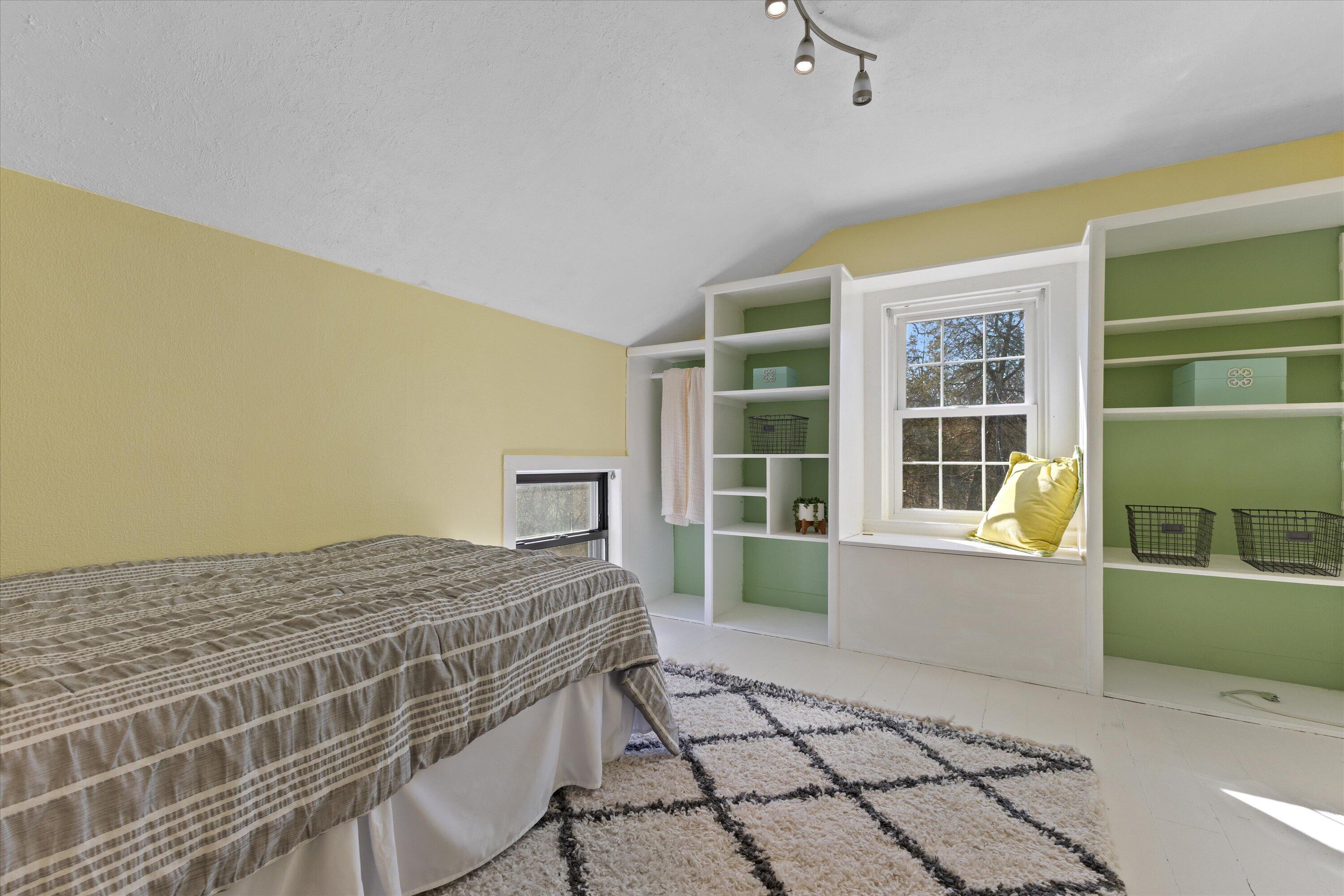 S38W31902 Wern Way Genesee, WI 53189 - Photo 19 of 67 Bedroom 2 with window seat and built in cabinets