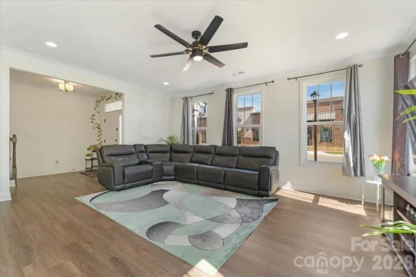 a living room with furniture and window