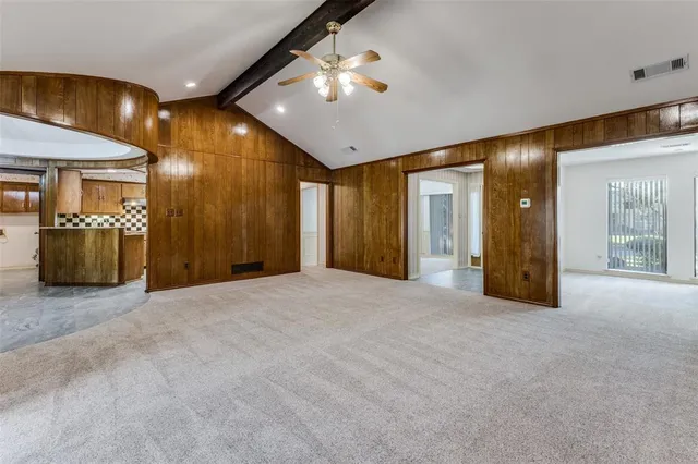 a view of a livingroom with a staircase