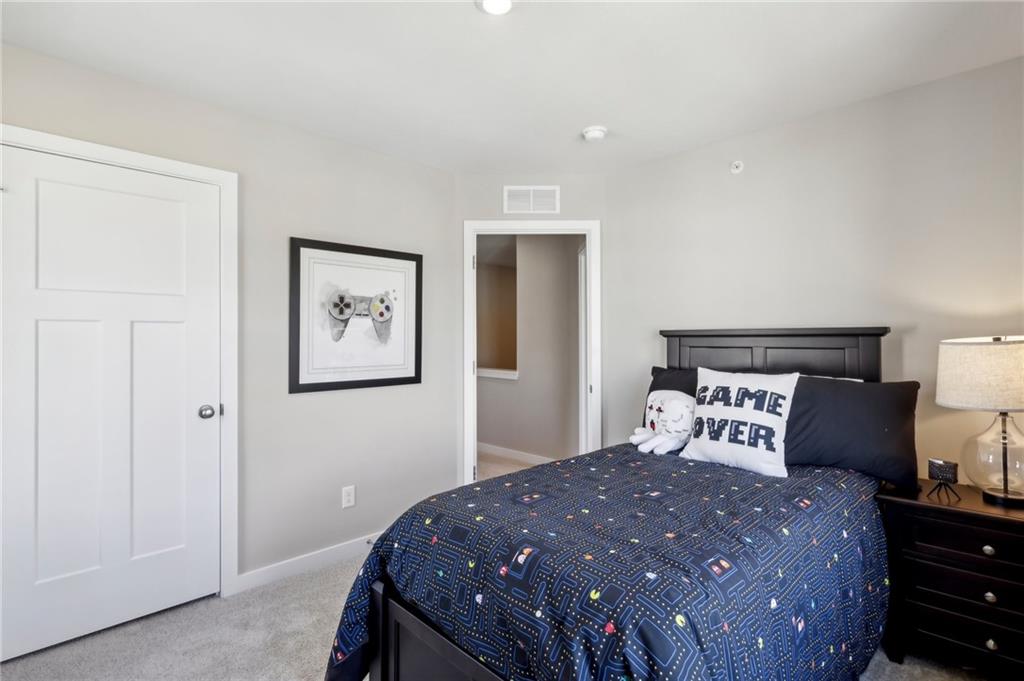 145 River Rdg Drive Moon Township, PA 15108 - Photo 17 of 23 a bedroom with a bed and painting on the wall