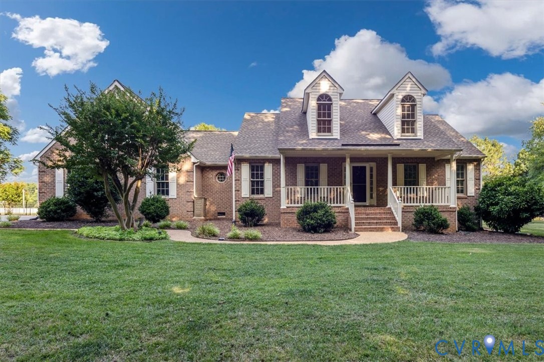 1437 Palmore Road Powhatan, VA 23139 - Photo 3 of 60 Brick exterior with white shutters and a covered f