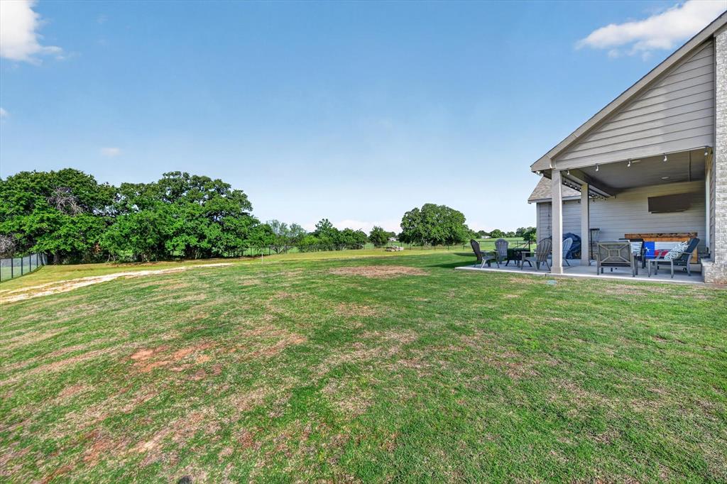 150 Chester Road Springtown, TX 76082 - Photo 35 of 40 a view of outdoor space yard and deck