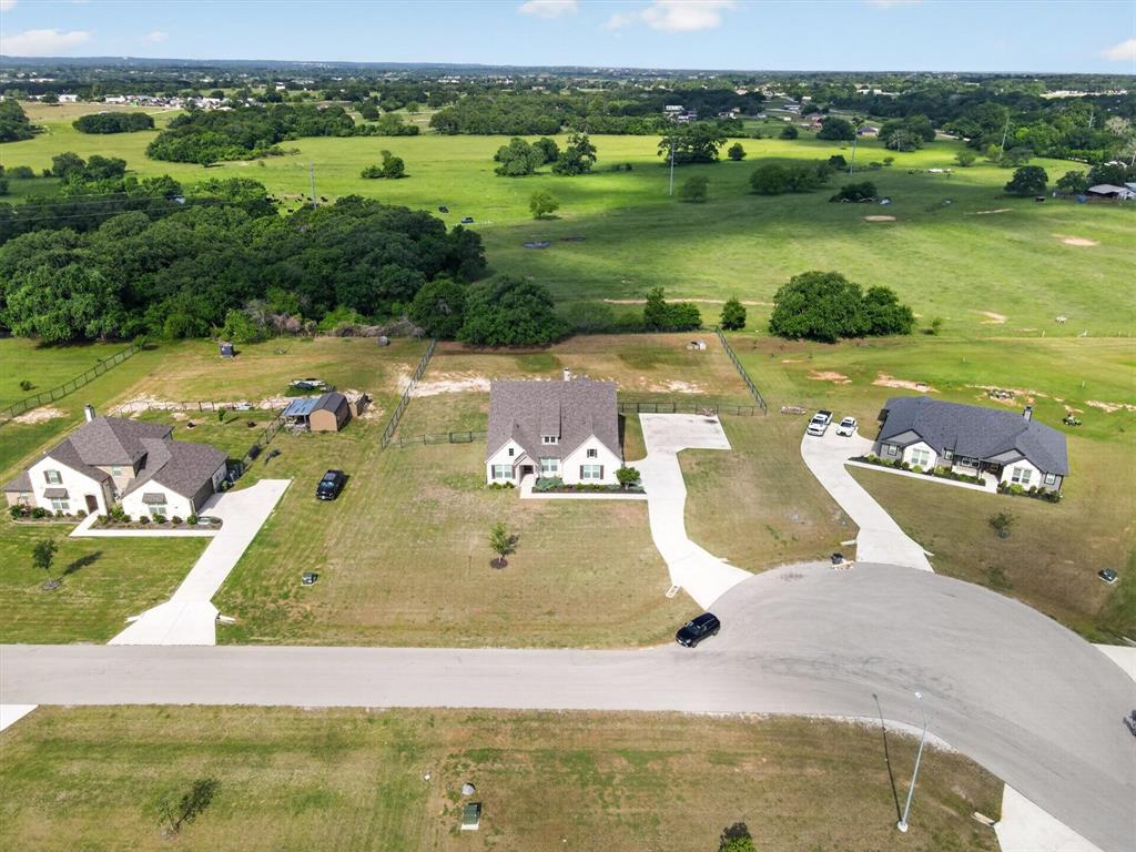 150 Chester Road Springtown, TX 76082 - Photo 38 of 40 a view of a lake with a yard