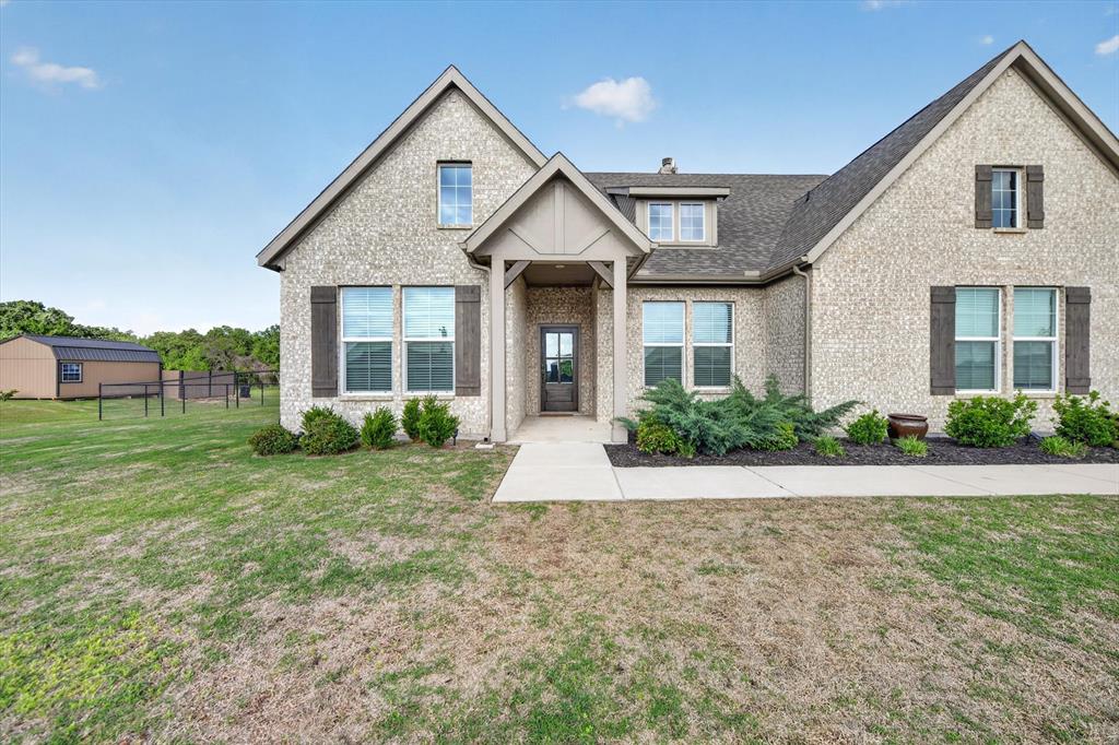 150 Chester Road Springtown, TX 76082 - Photo 4 of 40 a view of a house with yard and plants