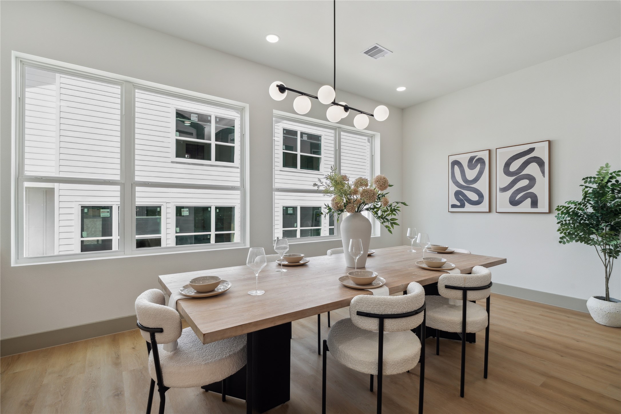 2943 Delafield Street Houston, TX 77023 - Photo 22 of 41 Effortlessly stylish, endlessly functional—this space redefines what it means to dine in at home.