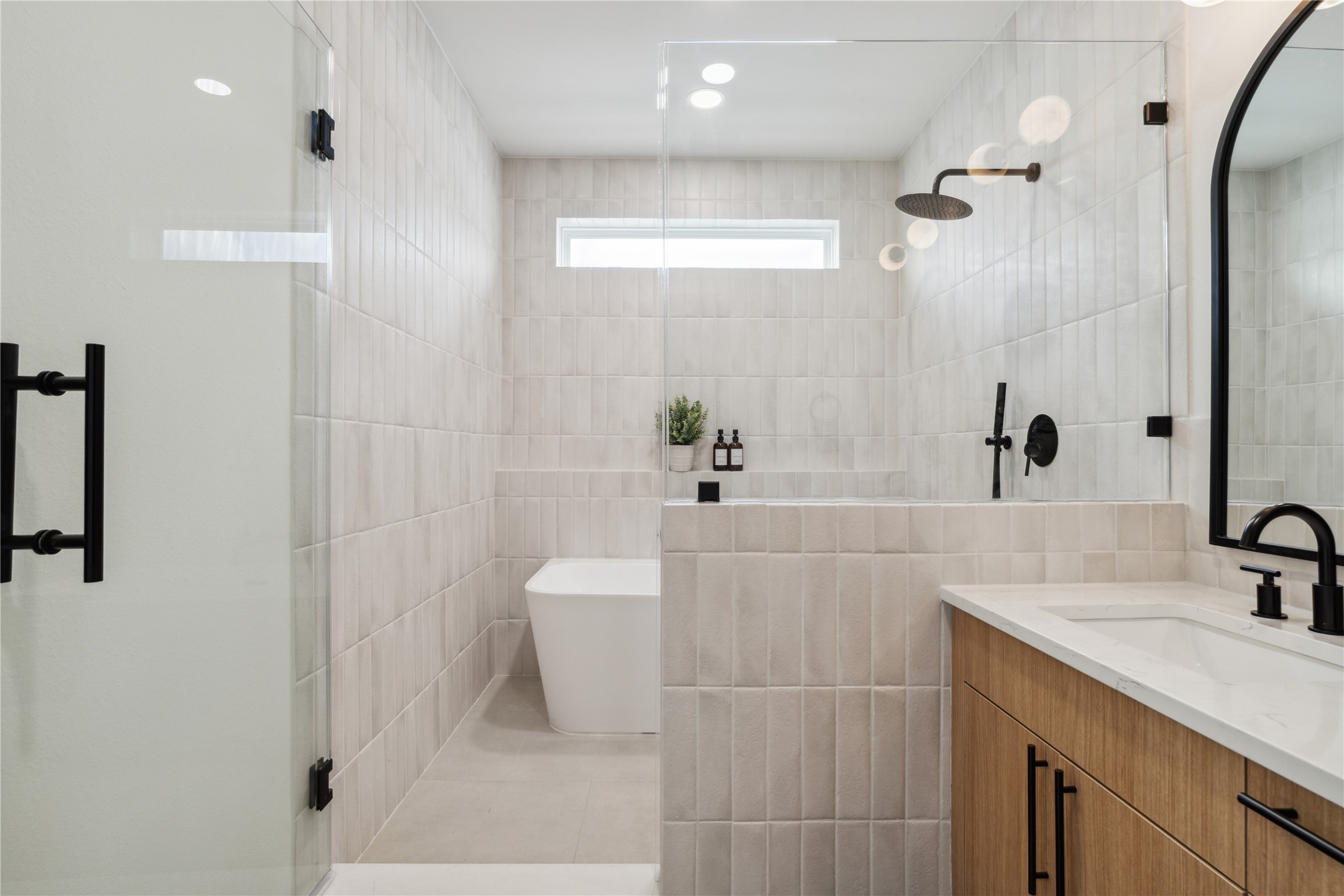 2943 Delafield Street Houston, TX 77023 - Photo 30 of 41 The freestanding tub becomes a sculptural centerpiece—perfect for quiet moments of restoration.