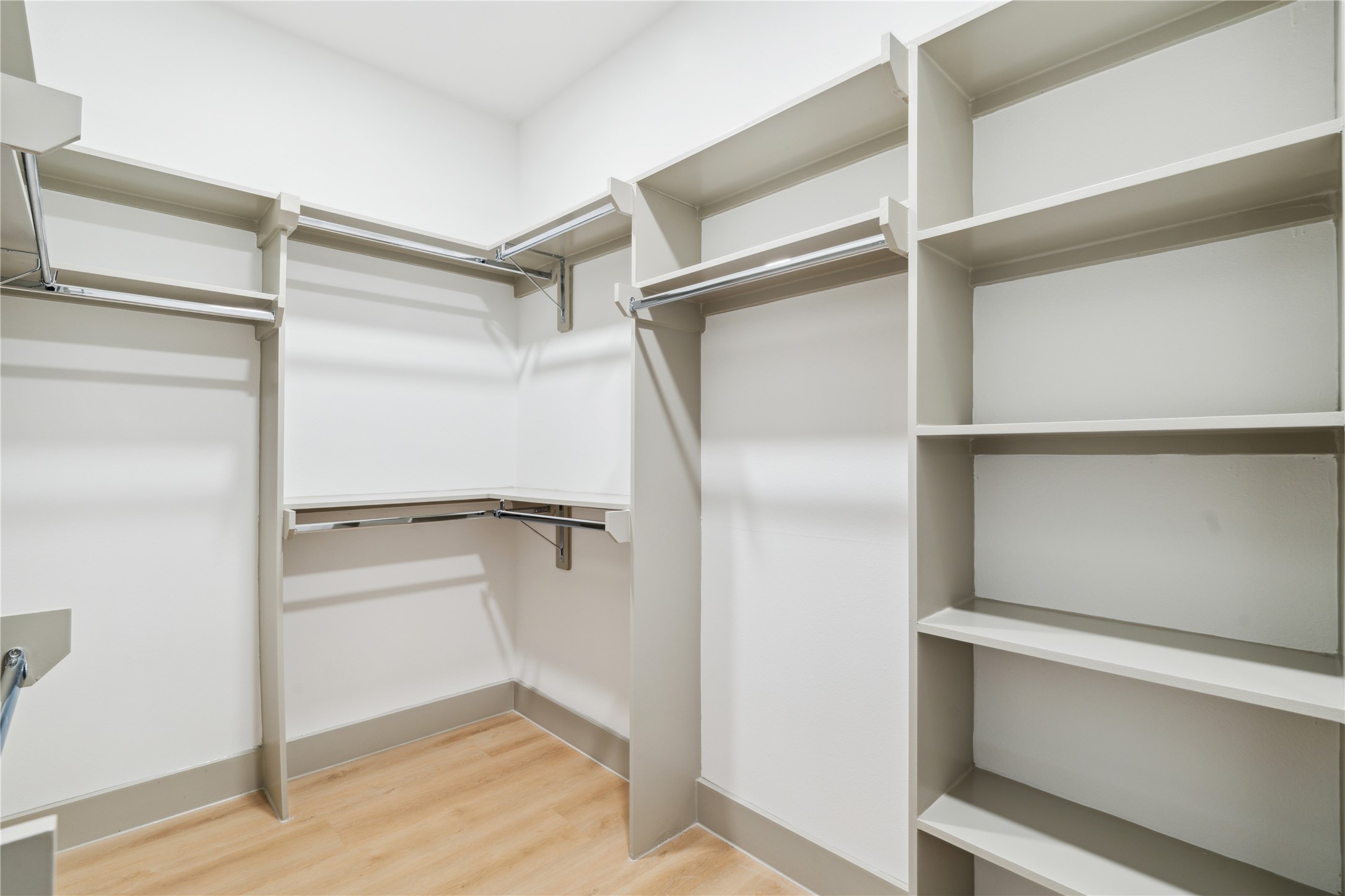 2943 Delafield Street Houston, TX 77023 - Photo 32 of 41 Custom shelving, double rods, and open corners create a space that’s as functional as it is serene.