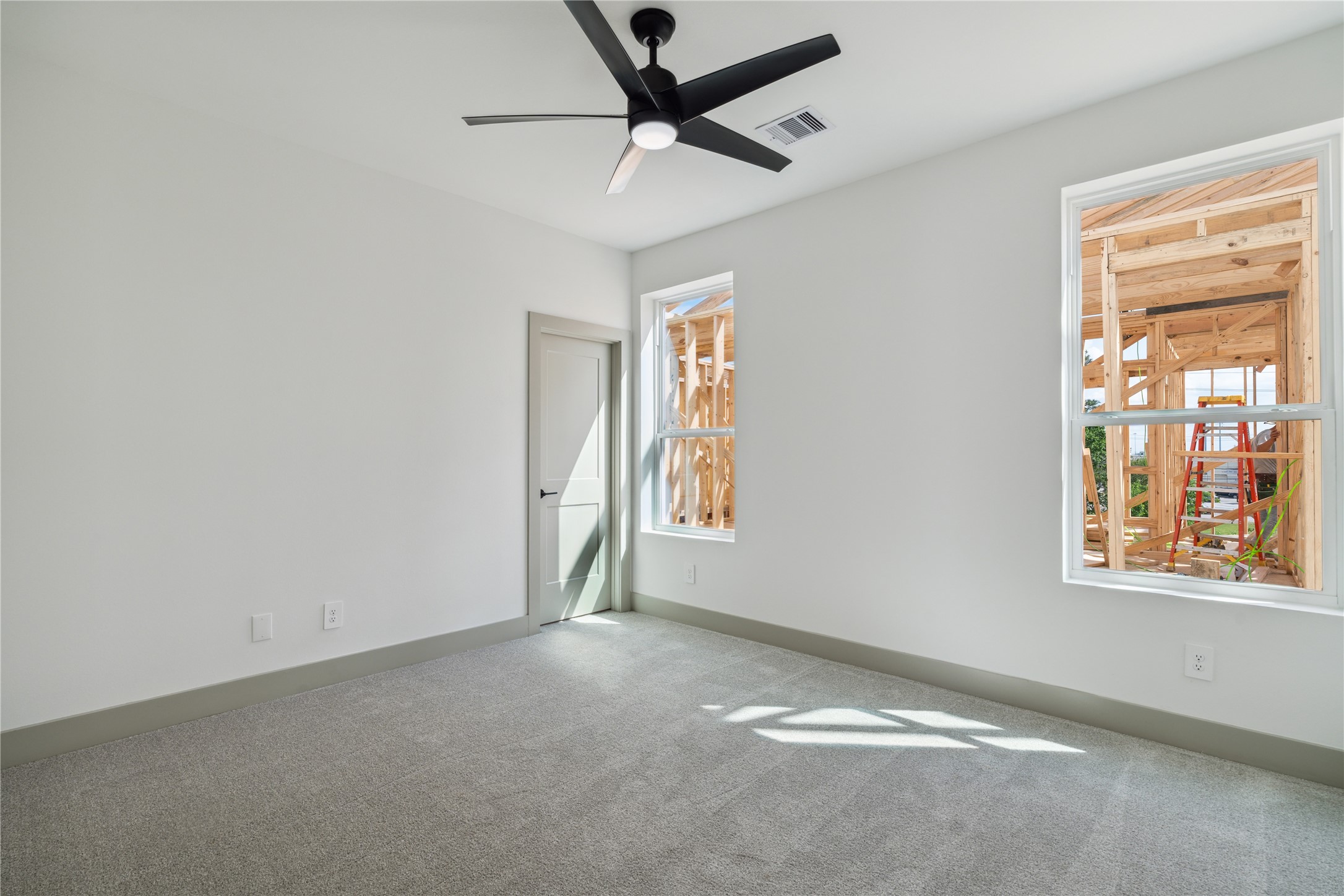 2943 Delafield Street Houston, TX 77023 - Photo 33 of 41 Whether styled for work, rest, or play, this room adapts to meet modern life with architectural grace.