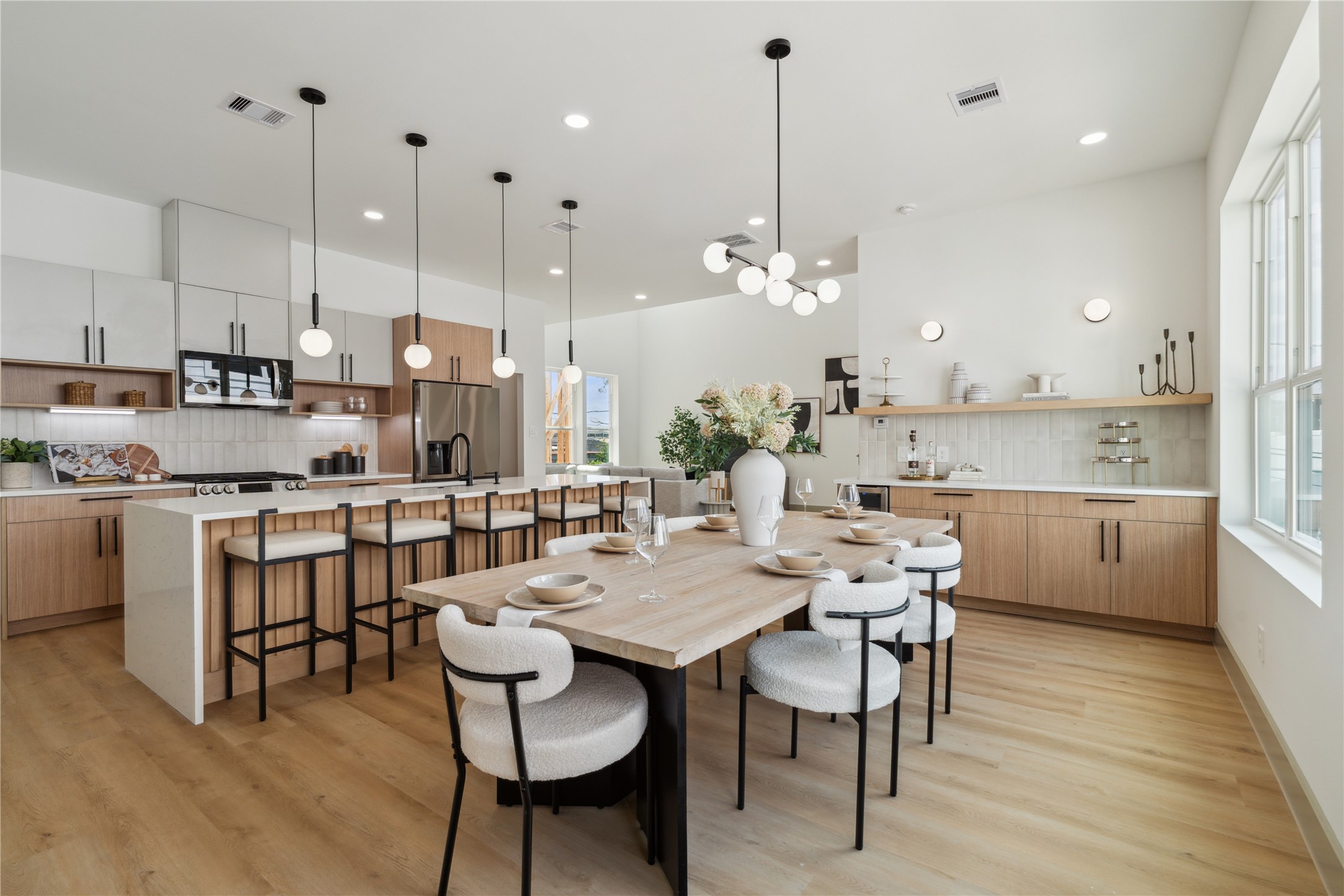 2943 Delafield Street Houston, TX 77023 - Photo 4 of 41 Warm woods, crisp whites, and bold accents create a modern aesthetic grounded in comfort and sophistication.