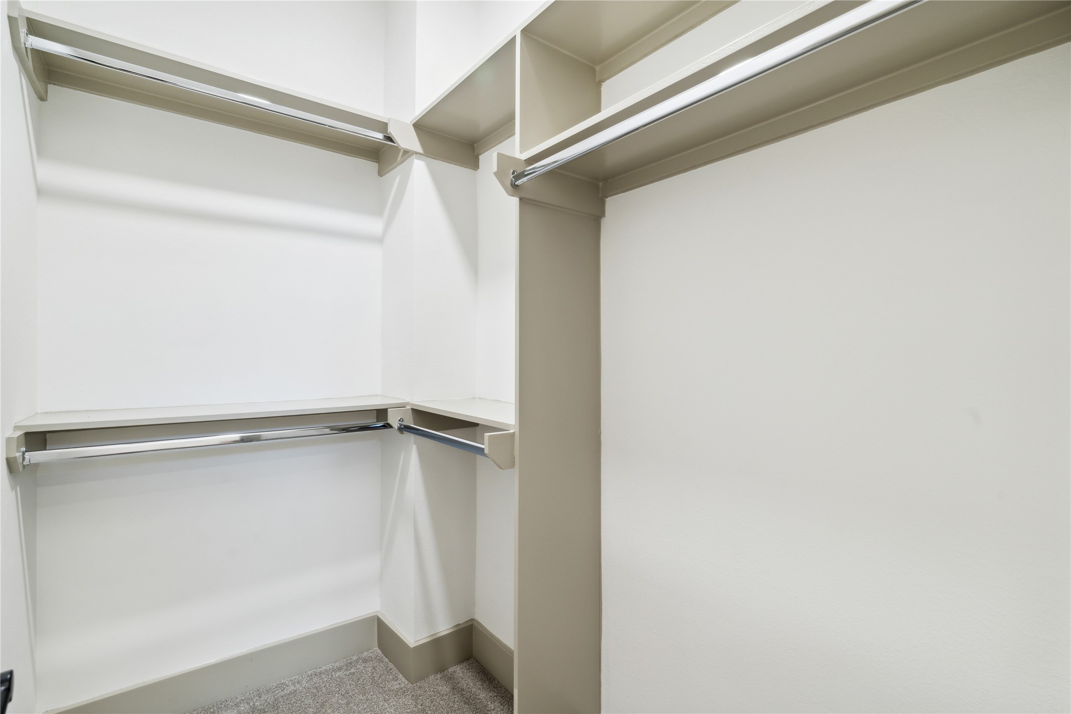 2943 Delafield Street Houston, TX 77023 - Photo 10 of 41 A meticulously designed walk-in closet offering ample storage and display options for wardrobe essentials.