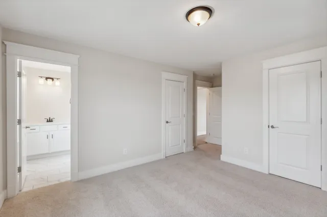 a bathroom with a bathtub and a sink