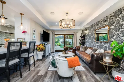 a bedroom with bed and a window