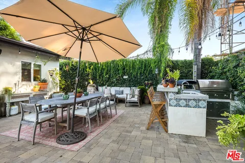 a backyard of a house with seating space
