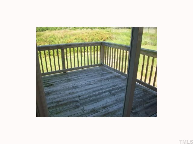 4903 Midstone Lane Raleigh, NC 27610 - Photo 5 of 11 a view of balcony with wooden floor