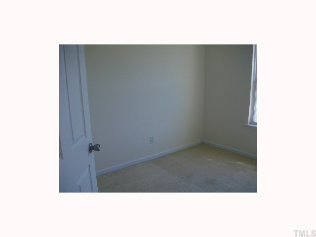 4903 Midstone Lane Raleigh, NC 27610 - Photo 9 of 11 a picture of door