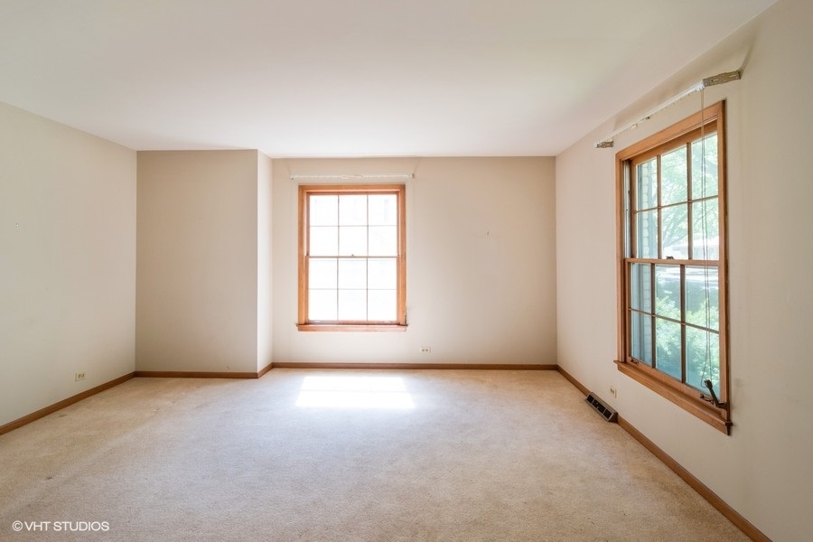 635 Spring Road Elmhurst, IL 60126 - Photo 2 of 16 an empty room with windows