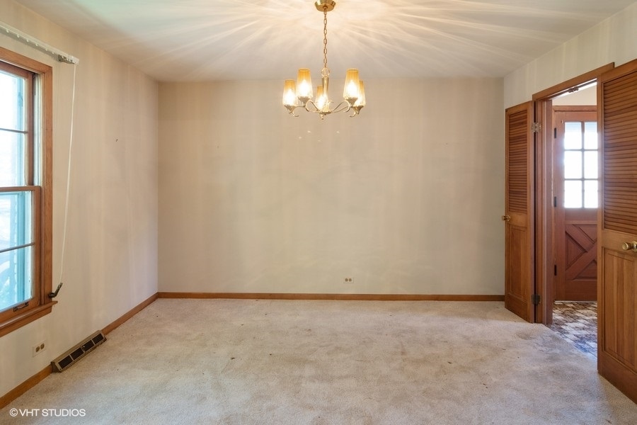 635 Spring Road Elmhurst, IL 60126 - Photo 3 of 16 a view of an empty room with a window