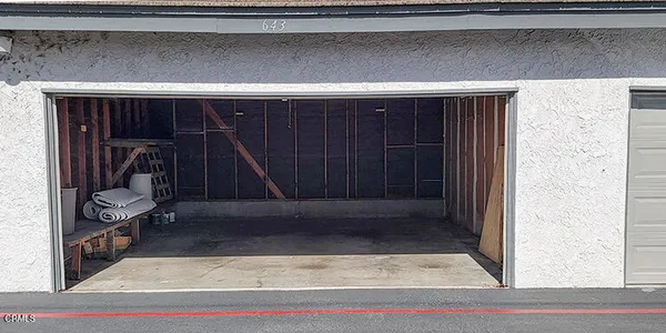 a view of a park with large trees