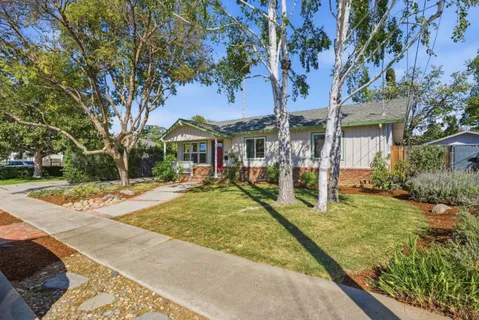 a view of house with outdoor space