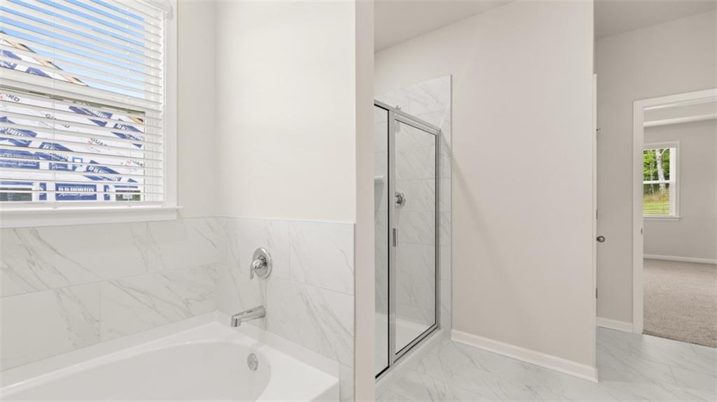 1090 Amerson Street Buckhead, GA 30625 - Photo 37 of 48 a bathroom with a bathtub