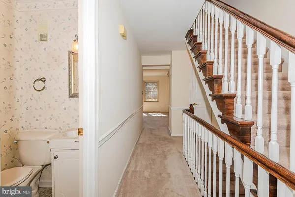 a bathroom with a sink a vanity and a mirror