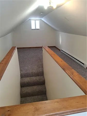 a view of a livingroom with a staircase