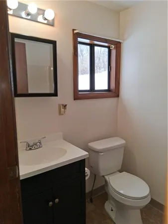 a bathroom with a shower and a shower