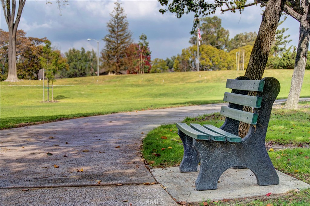 13515 Avenida Santa Tecla, Unit 210D La Mirada, CA 90638 - Photo 3 of 26 a view of a yard with an outdoor space