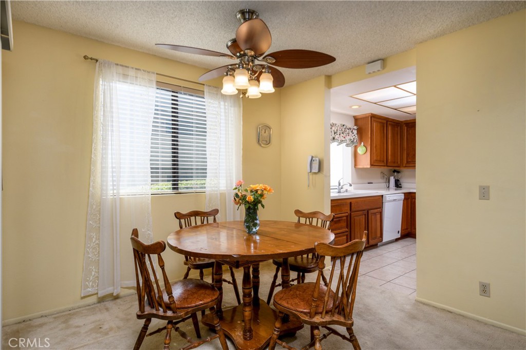 13515 Avenida Santa Tecla, Unit 210D La Mirada, CA 90638 - Photo 7 of 26 a dining room with furniture and window