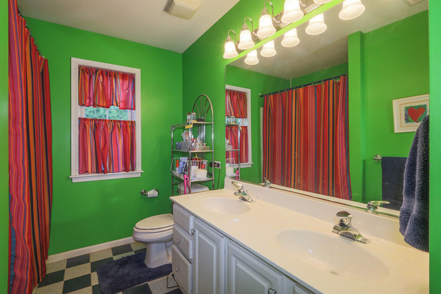2639 Saltmeadow Road Naperville, IL 60564 - Photo 18 of 25 a bathroom with a sink toilet and a mirror