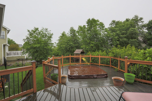 2639 Saltmeadow Road Naperville, IL 60564 - Photo 23 of 25 a view of a balcony with wooden floor and outdoor seating