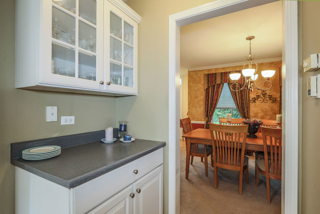 2639 Saltmeadow Road Naperville, IL 60564 - Photo 8 of 25 a kitchen with a table and chairs