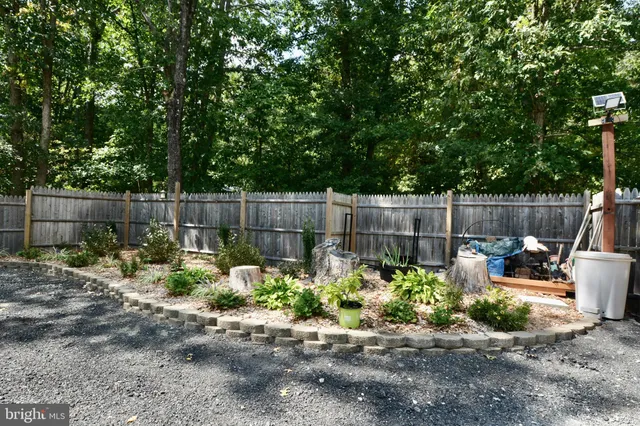a view of a backyard with a garden