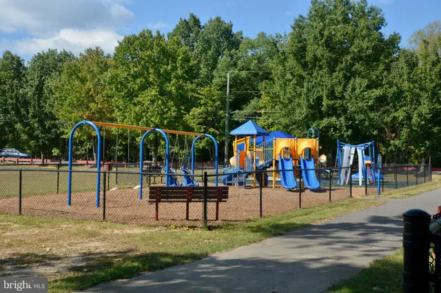 a view of a park with swings