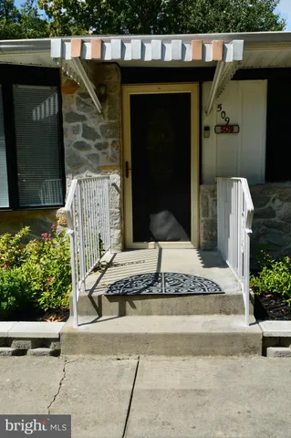 a building with trees in the background