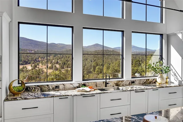 a kitchen with a sink and a window